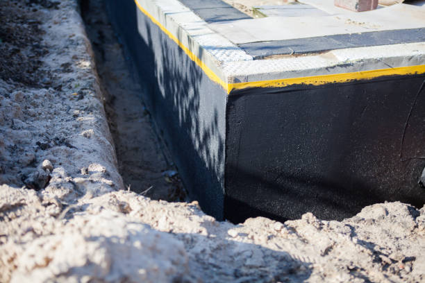 Professional Waterproofing technician working in Genesee Depot, WI